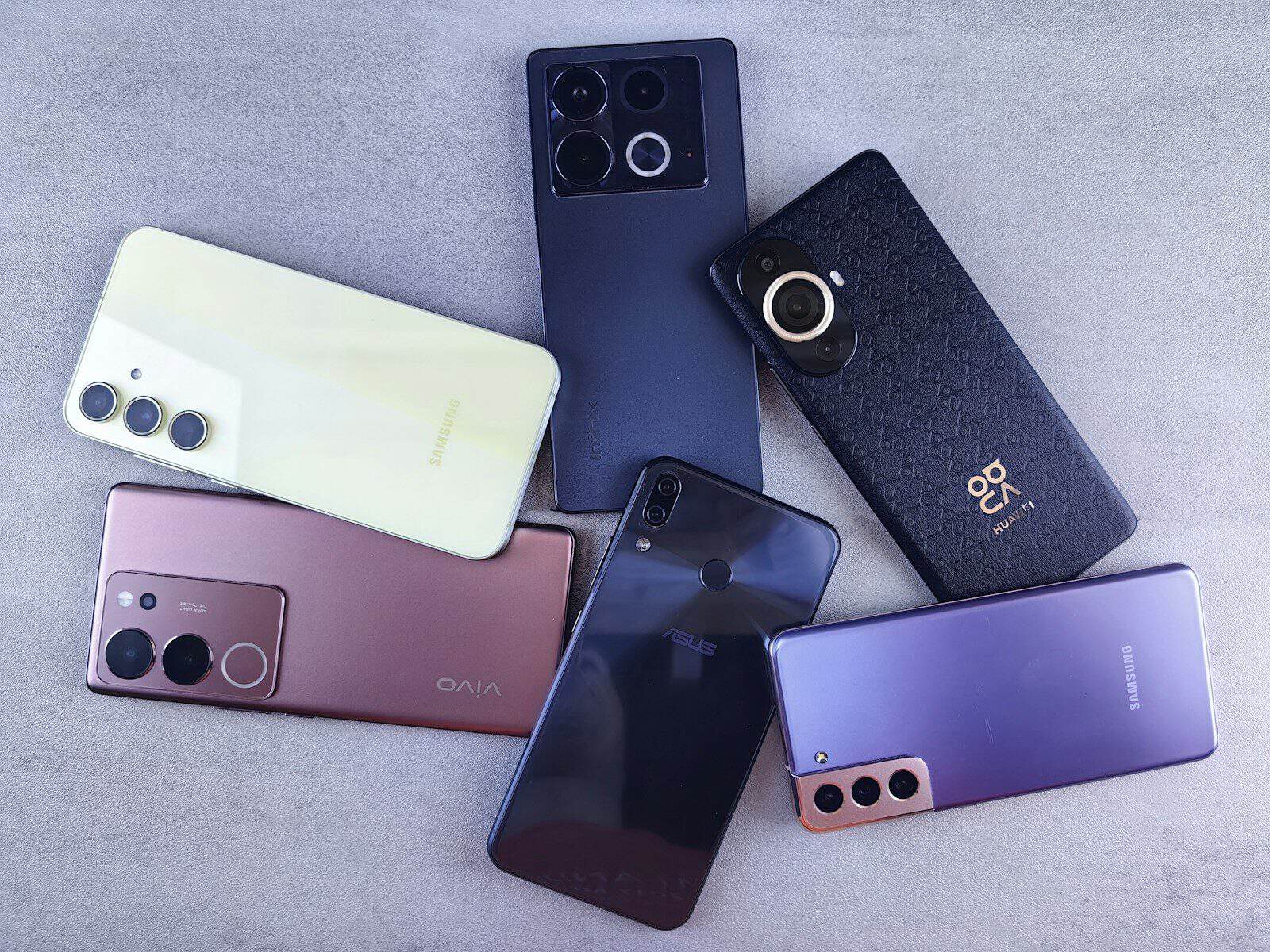 A group of cell phones sitting next to each other