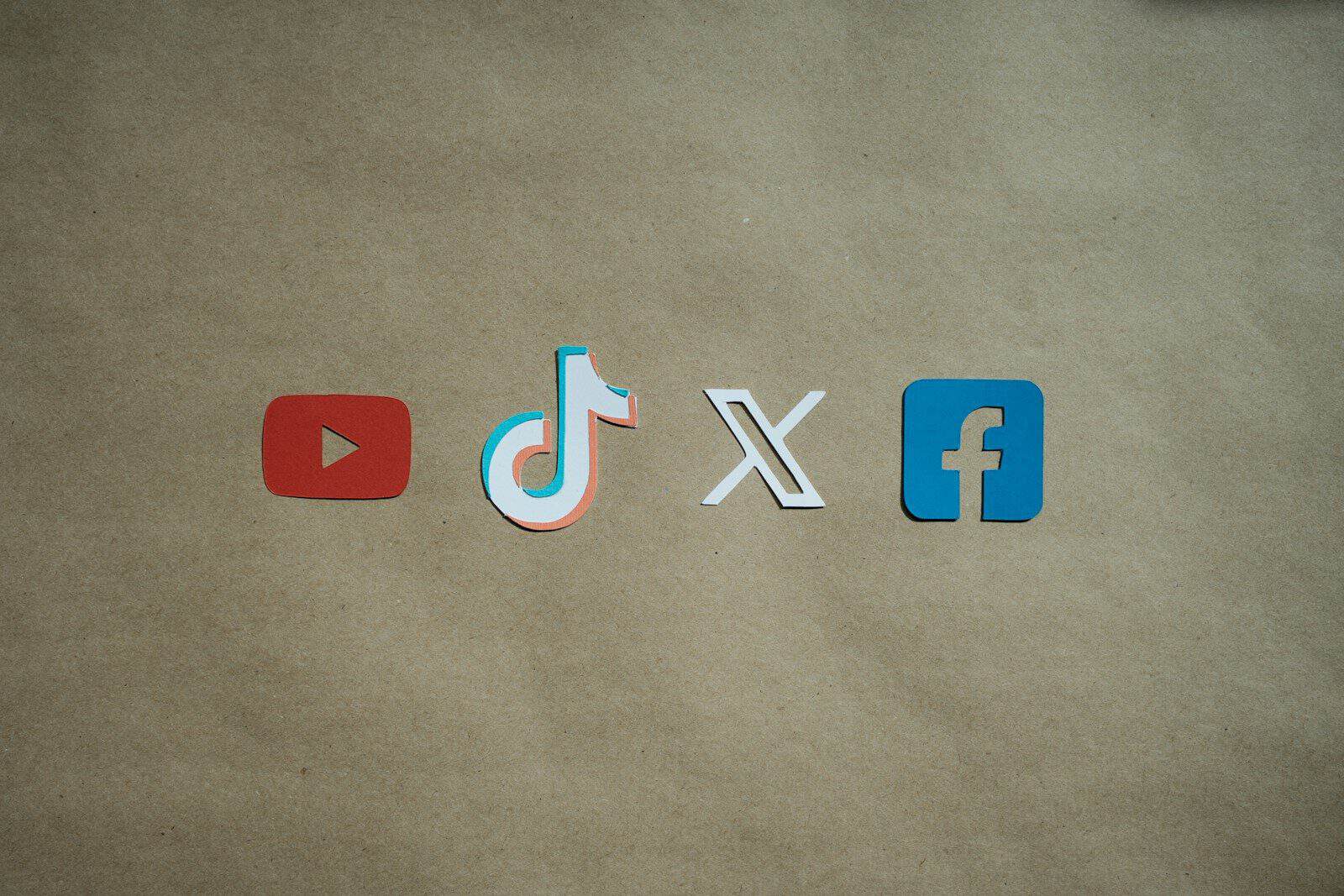 a group of cut out letters that spell out the word dxo