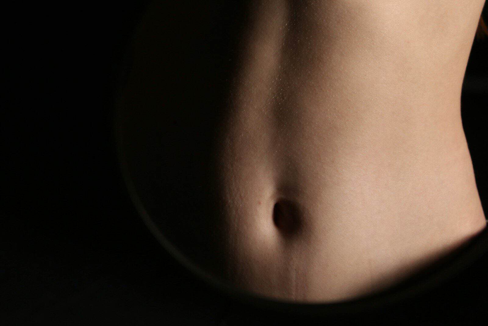 A close-up of a person's abdomen