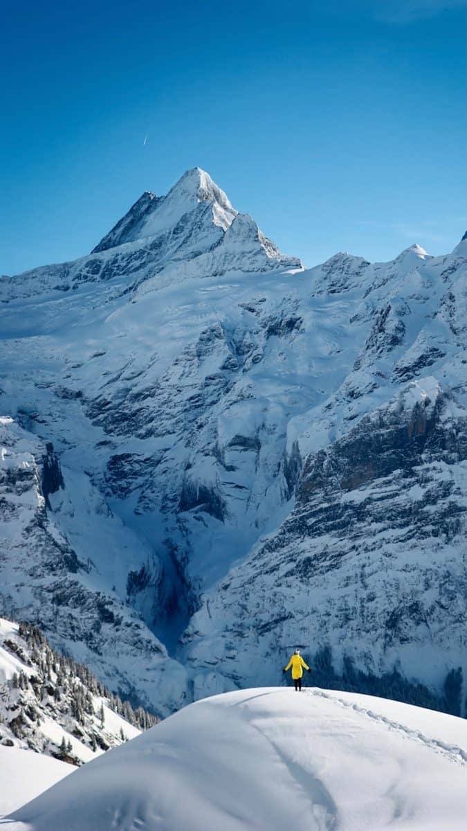 snow covered mountain during daytime