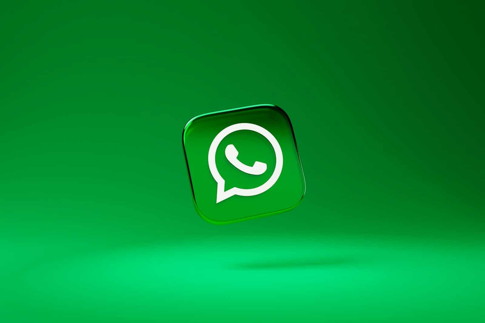 A glossy green square icon with a white telephone handset inside a speech bubble