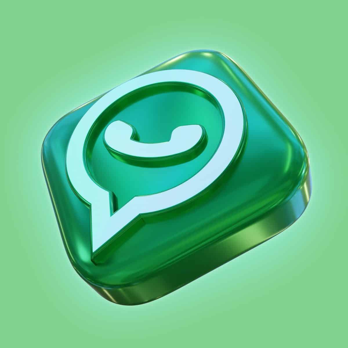 A glossy green three-dimensional icon of a speech bubble with a telephone handset