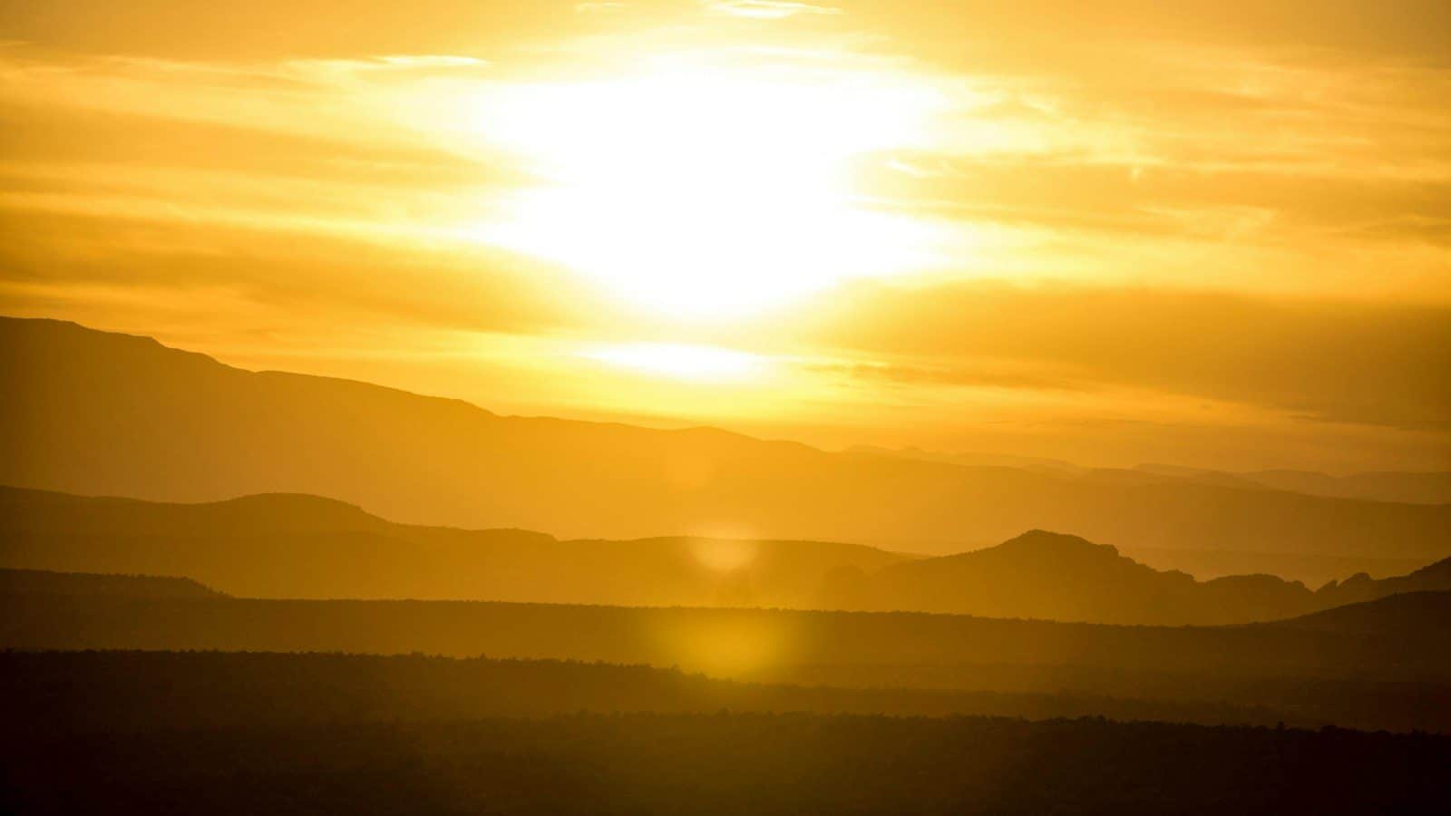 silhouette of mountains during golden hour