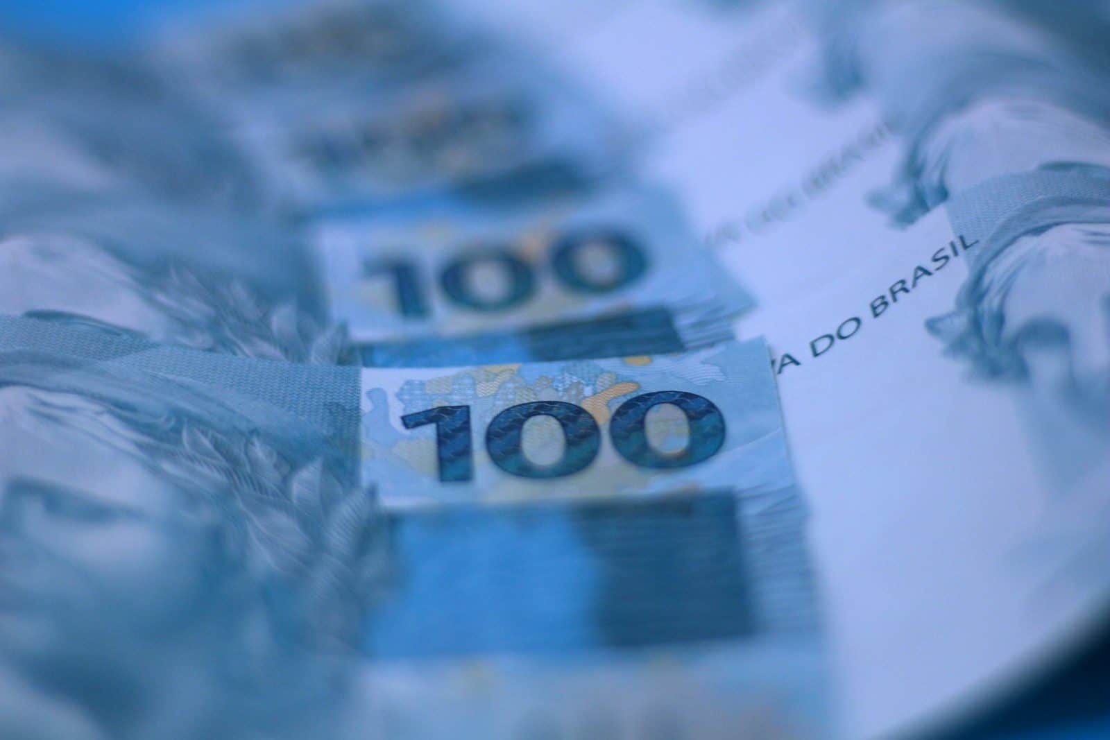 A close up of a hundred dollar bill