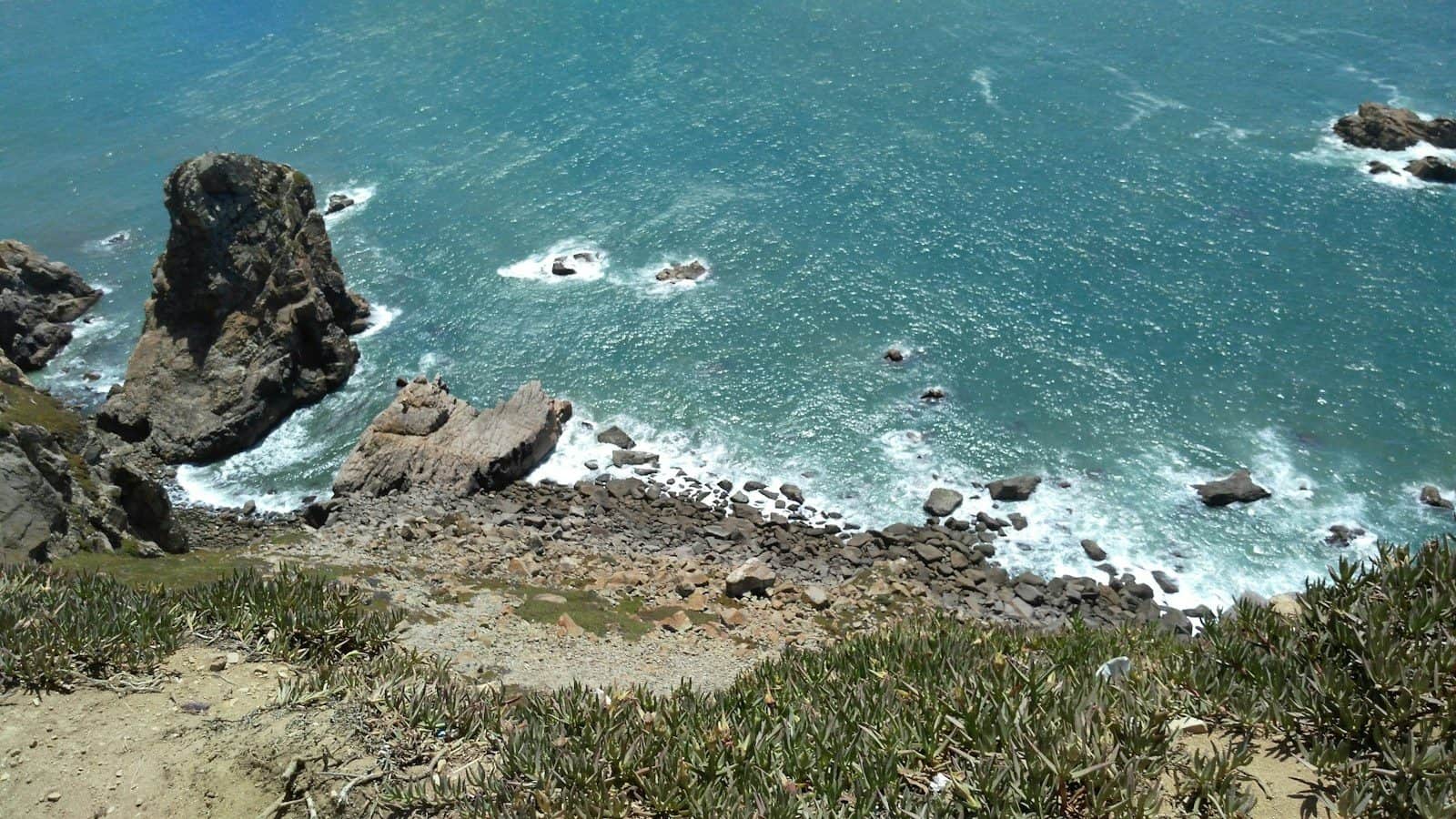 a view of a body of water from a hill