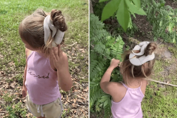 Menina de 3 anos aparece com cobra enrolada no cabelo e surpreende nas redes sociais