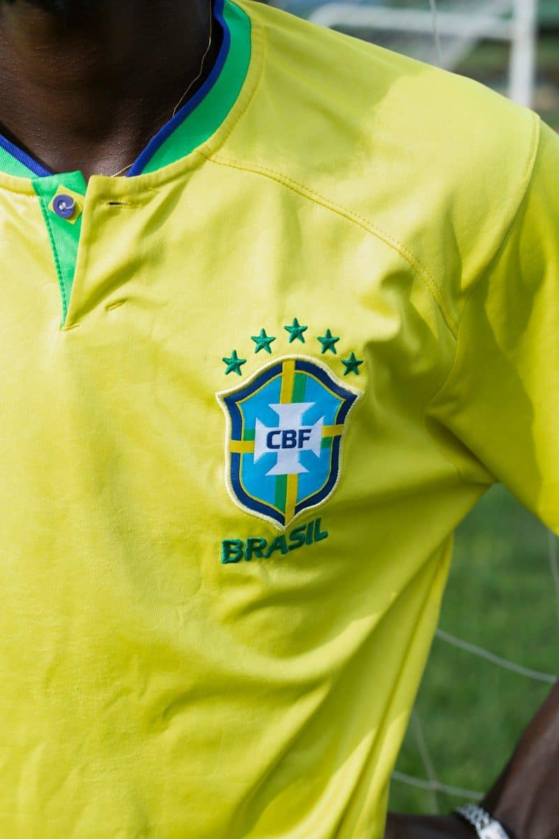 Person wearing a yellow brazil national soccer team jersey