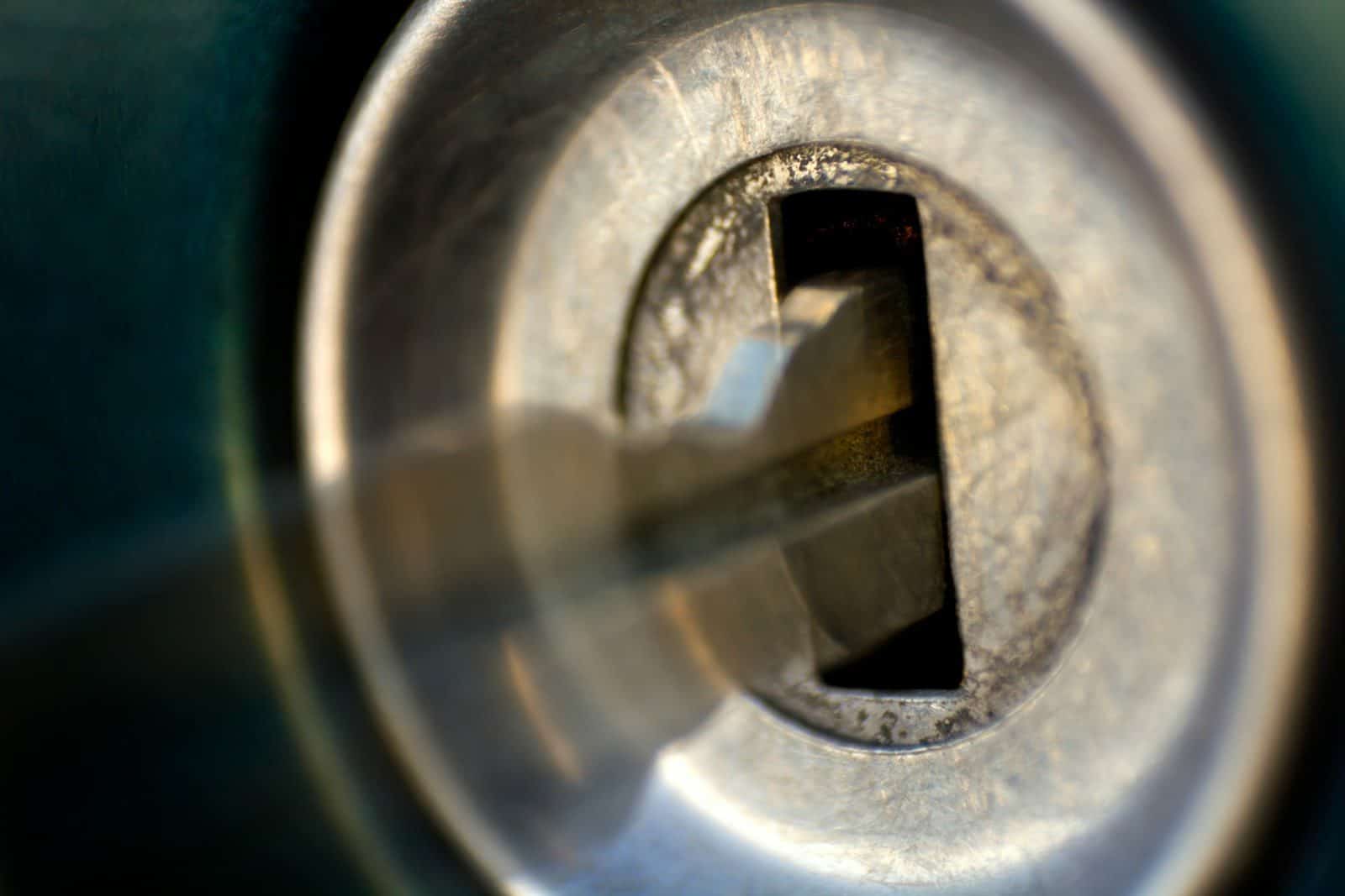 A key is inserted into a lock mechanism