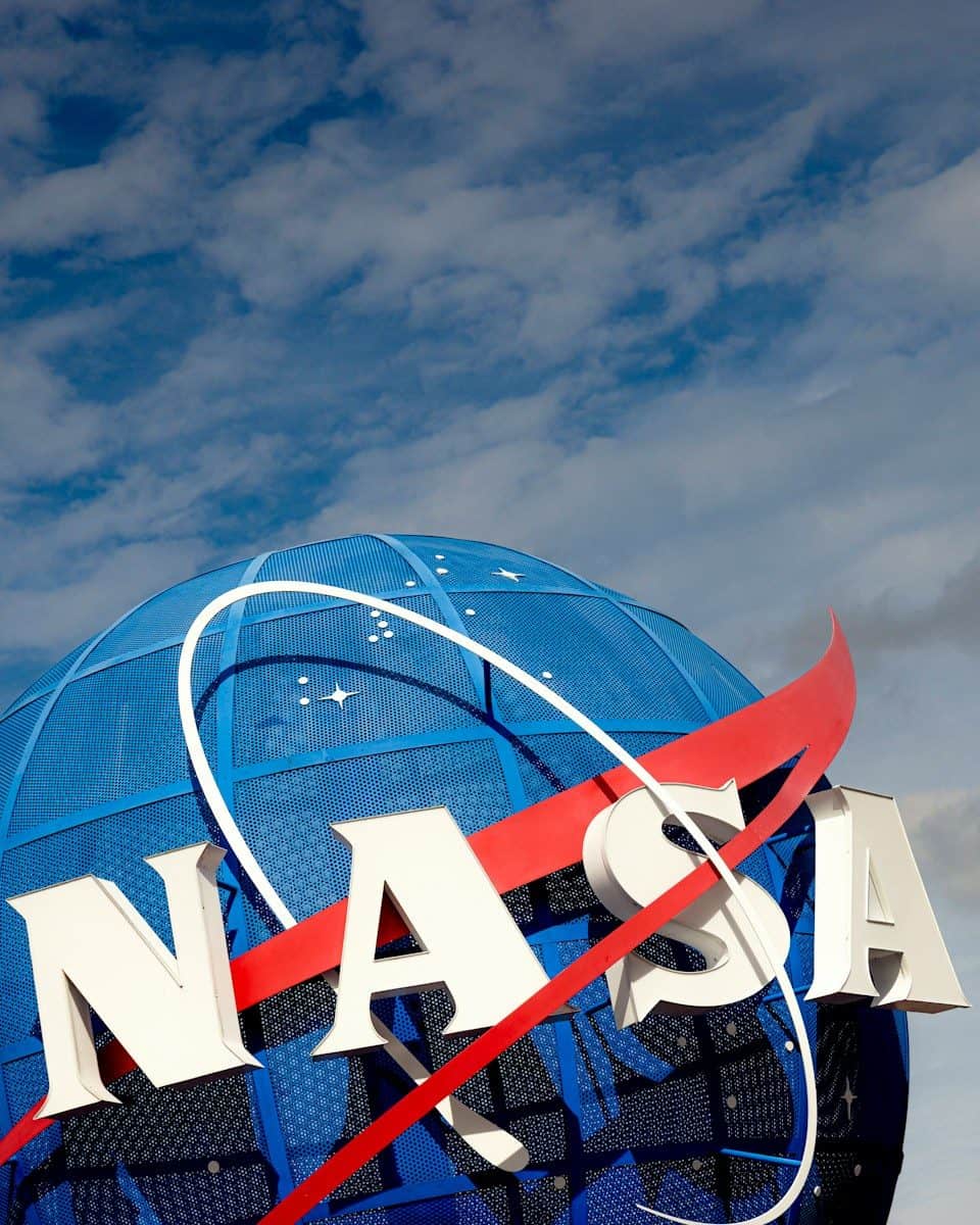 a nasa sign is shown against a blue sky